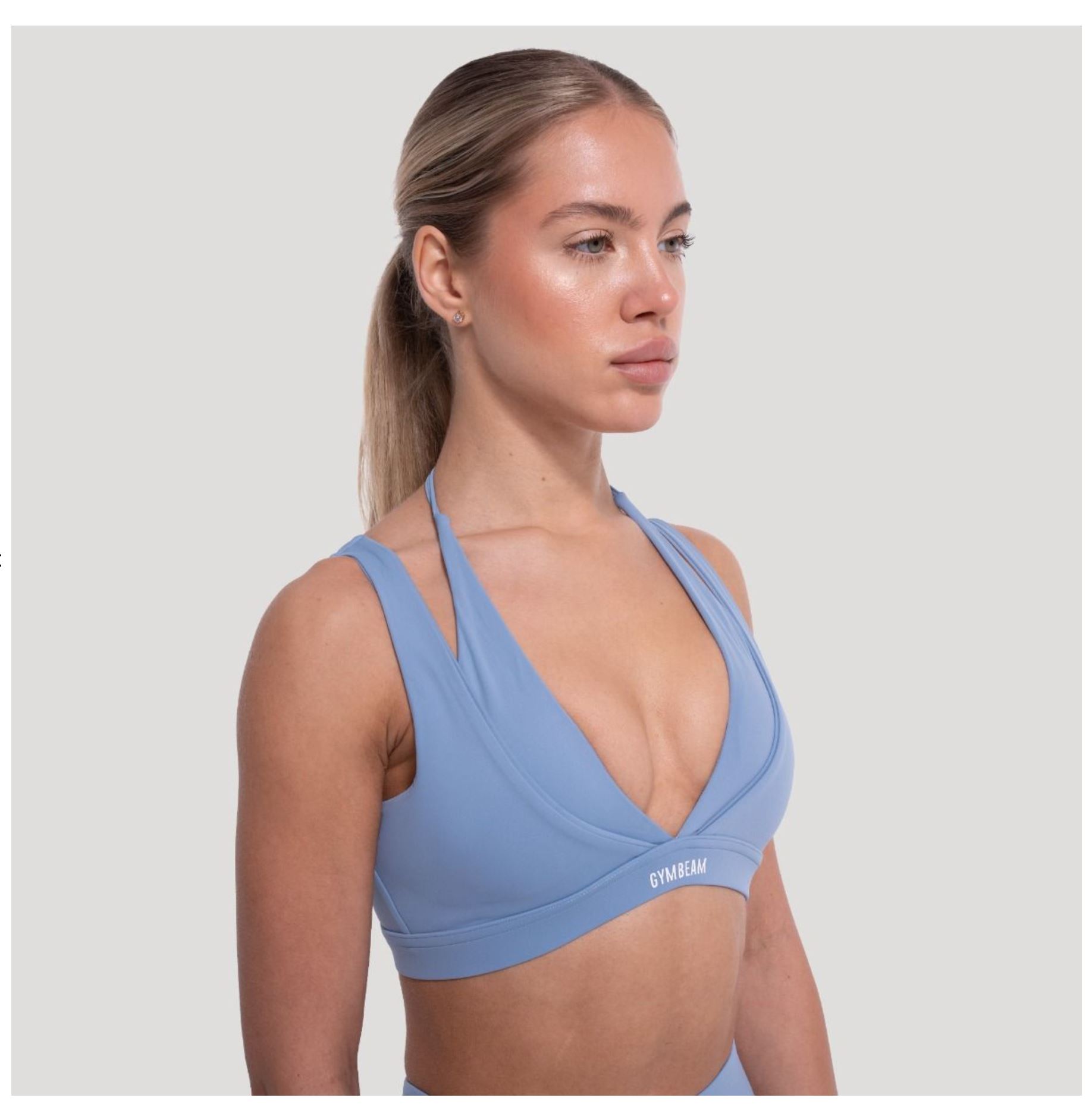 GymBeam Sport-BH FLOW Azurblau zweilagiges Design Fitness-BH mit Stützkraft & V-Ausschnitt Gr. L
