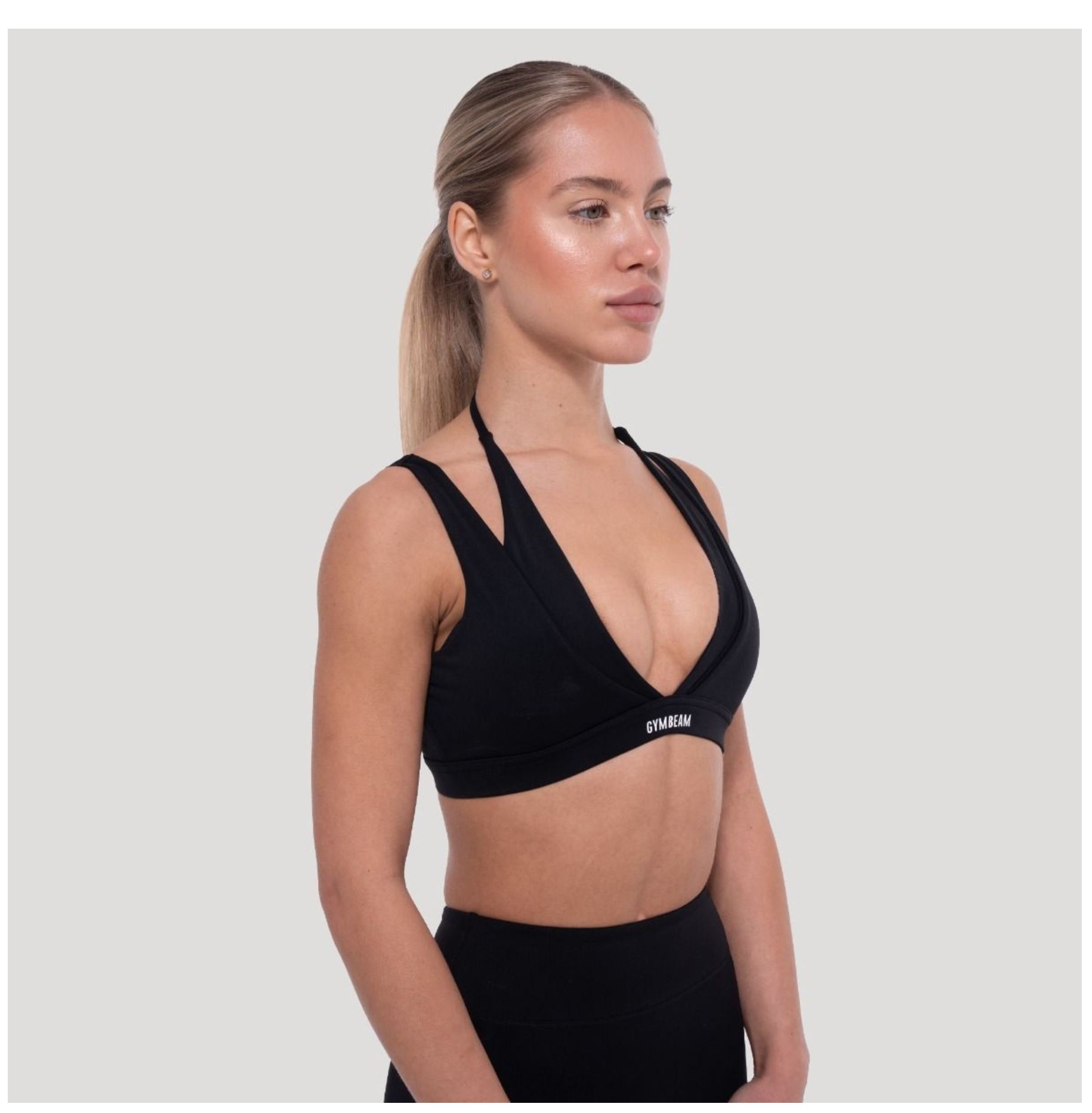 GymBeam Sport-BH FLOW in schwarz zweilagiges Design Fitness-BH mit Stützkraft & V-Ausschnitt Gr. S