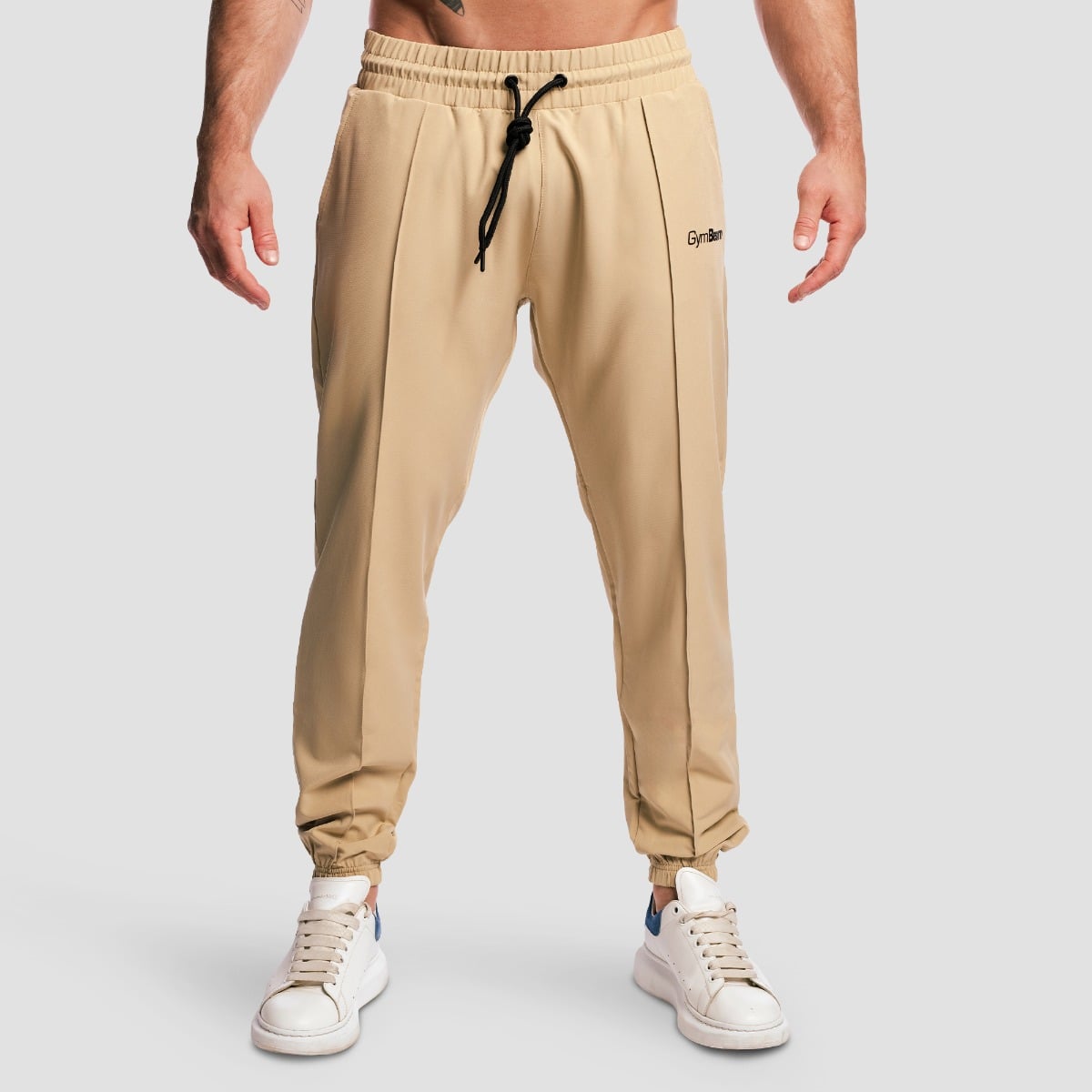 GymBeam ARC Hose in beige für Herren mit Knöchelbund bequeme Männerhose im Joggerschnitt Gr. S